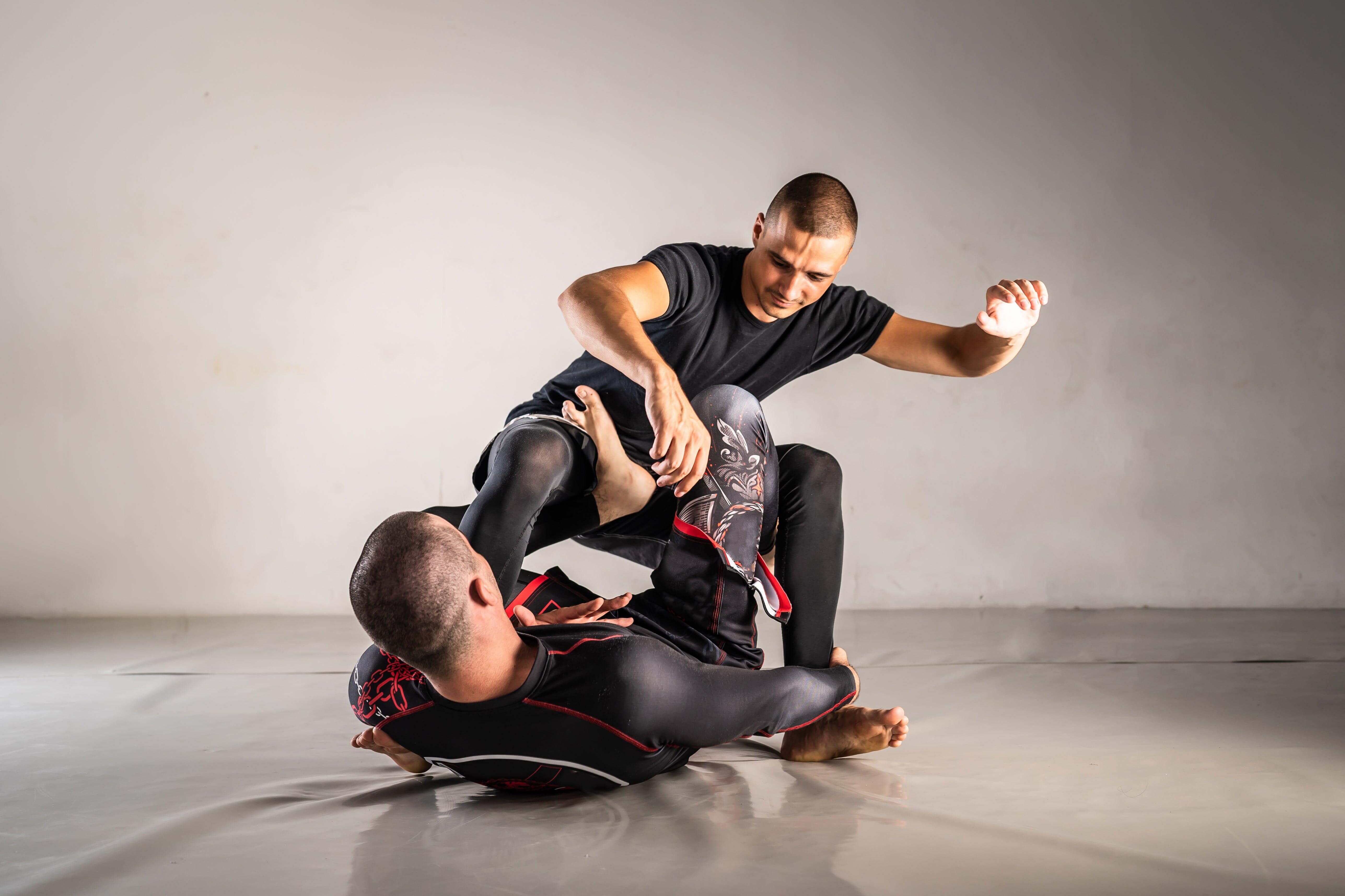 Mastering the Art of Sweeps: Unlocking the Key to Effective Guard Passing in Brazilian Jiu-Jitsu - CYPHR Combat