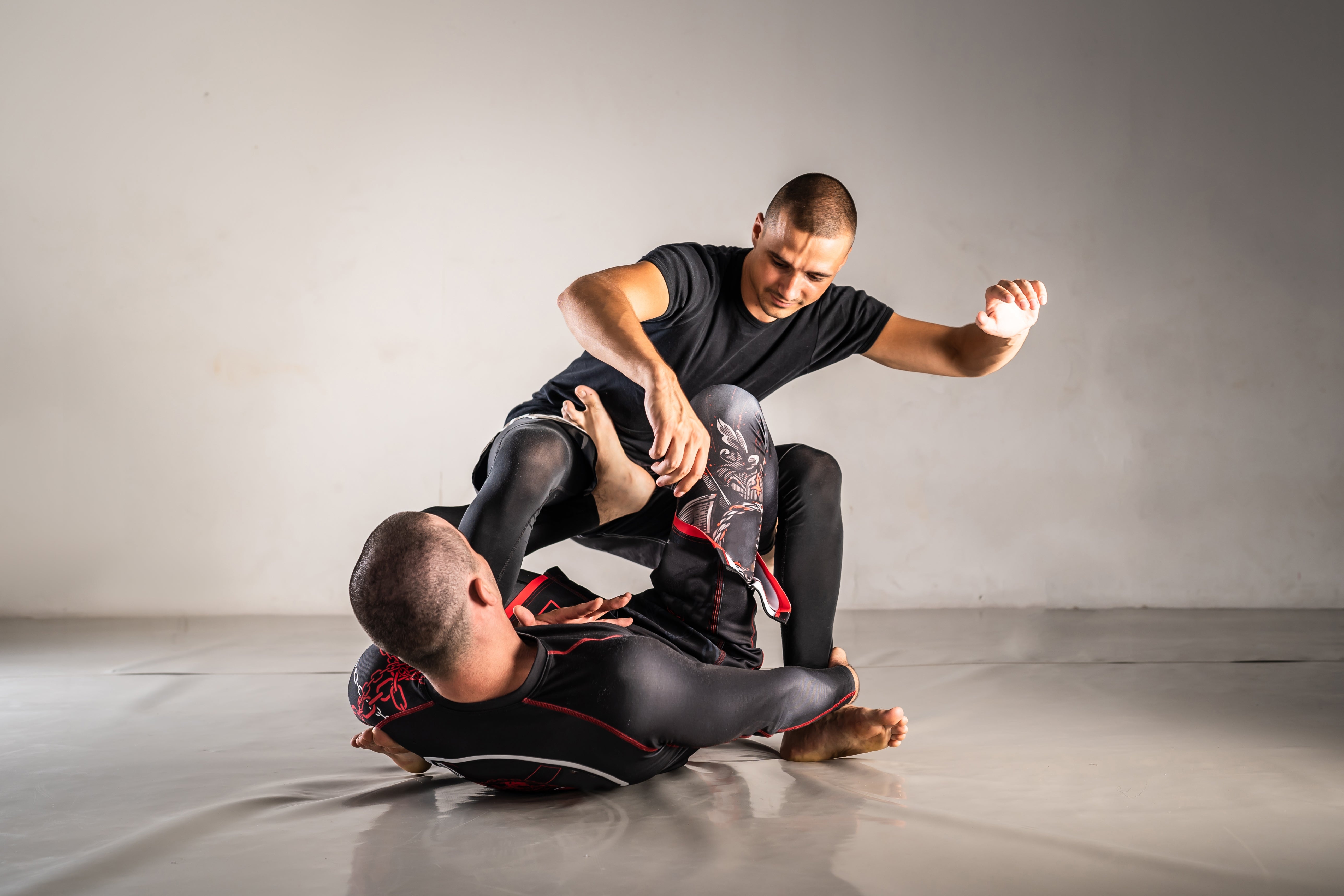 Mastering the Art of Sweeps: Unlocking the Key to Effective Guard Passing in Brazilian Jiu-Jitsu