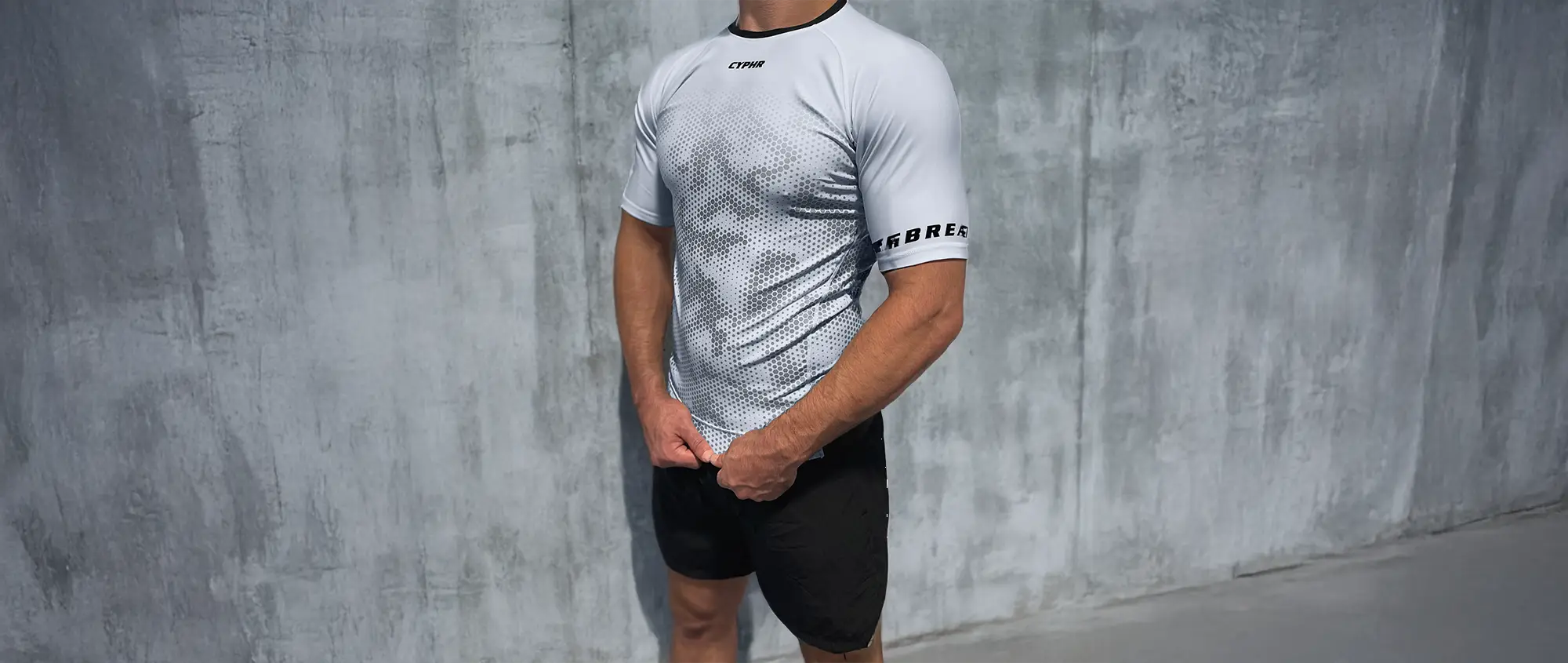 CYPHR Combat BJJ rash guard for men in white, showcasing breathable fabric and sleek design for Brazilian Jiu-Jitsu training.