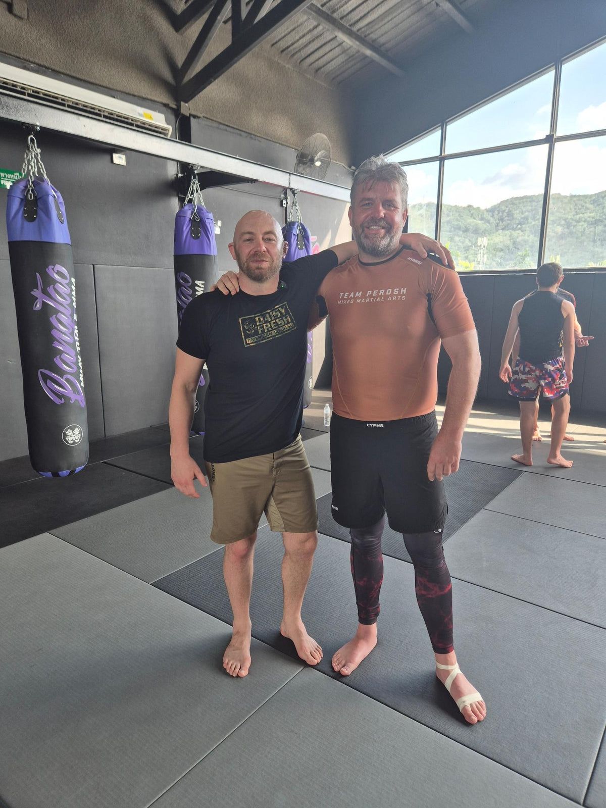 Josh Willis with Heath Pedigo at a jiu-jitsu training camp in Thailand