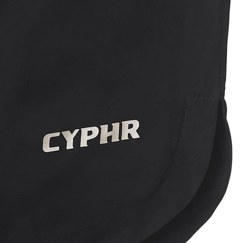 Close-up of CYPHR logo on black Apex Quick-Dry Flex Shorts for Brazilian Jiu Jitsu with two-way stretch fabric.