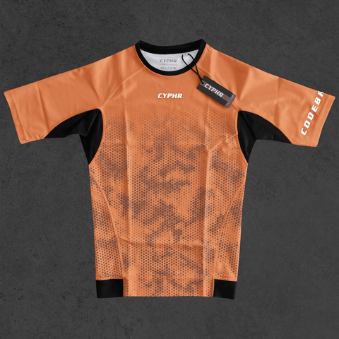 Short Sleeve Hexagon Camouflage BJJ Rash Guard in Brown from CYPHR Codebreaker Series, featuring innovative design for athletes