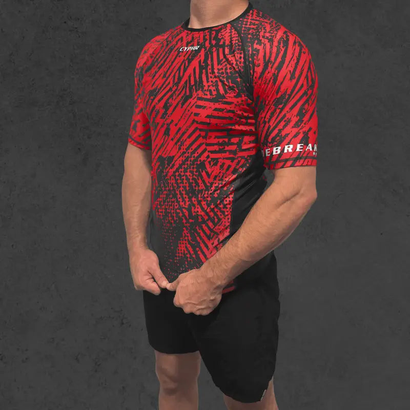 Red and black geometric Cyphr Combat Rash Guard designed for BJJ and combat training